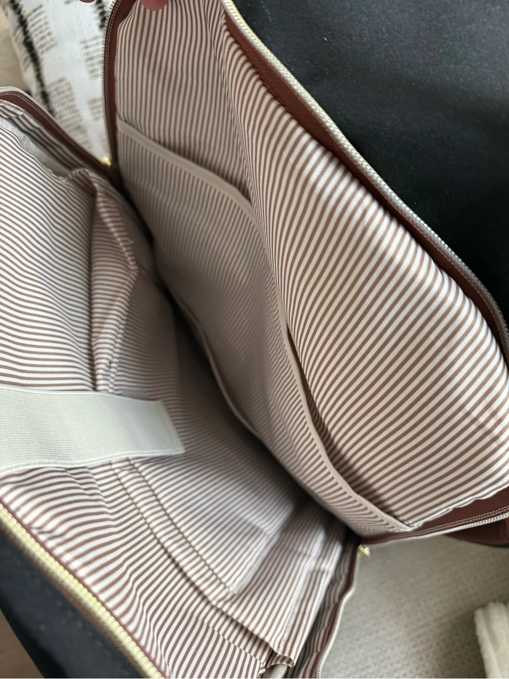 Black and Brown Men's Backpack with Gold Hardware